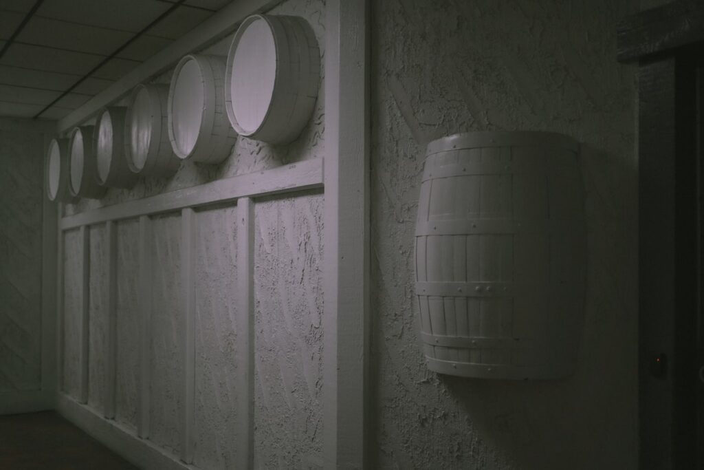 Wine barrels in a heritage winery barrel room