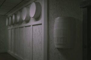 Wine barrels in a heritage winery barrel room