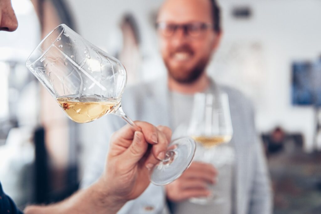 Wine tasting guests smiling enjoying experience