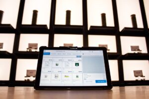 Winery tasting room staff reviewing guest reservation on tablet